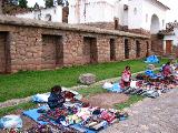 Market on the church plaza. Note the Inca walls behind.