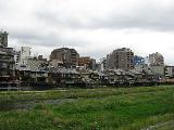 Along the Kamogawa river. Note the various building styles.