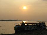 Sunset by the Mekong. Thailand looks so close.